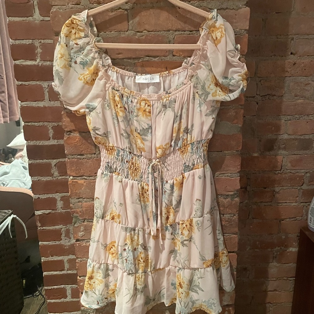 Bacio Floral mini dress with peasant sleeves and cute lace up detail